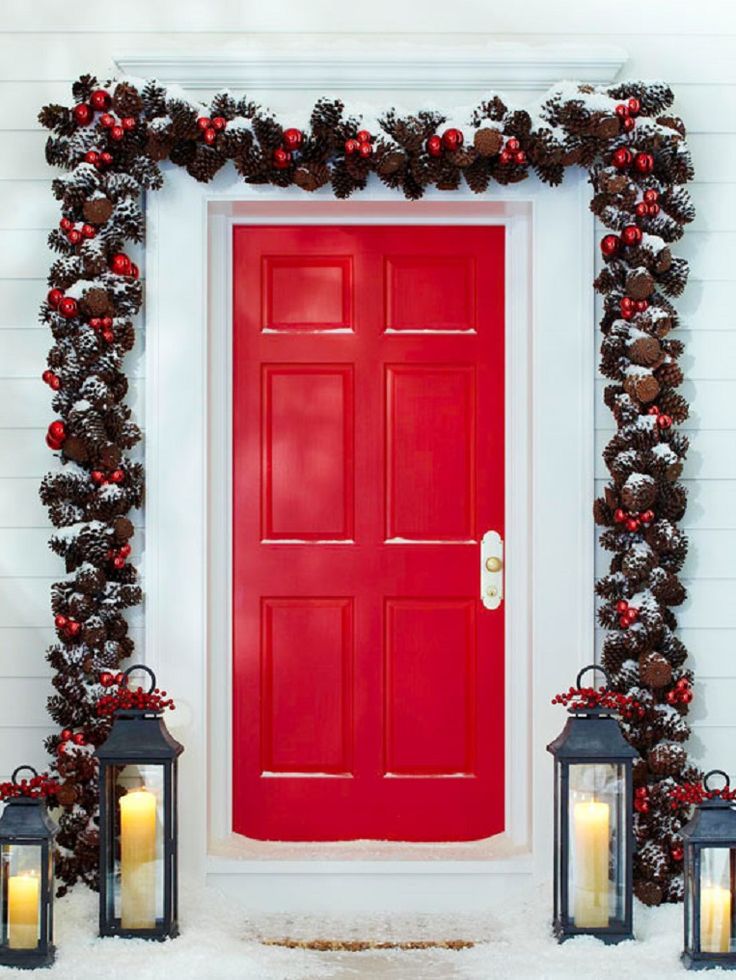 Christmas Garland Around Door with Lanterns