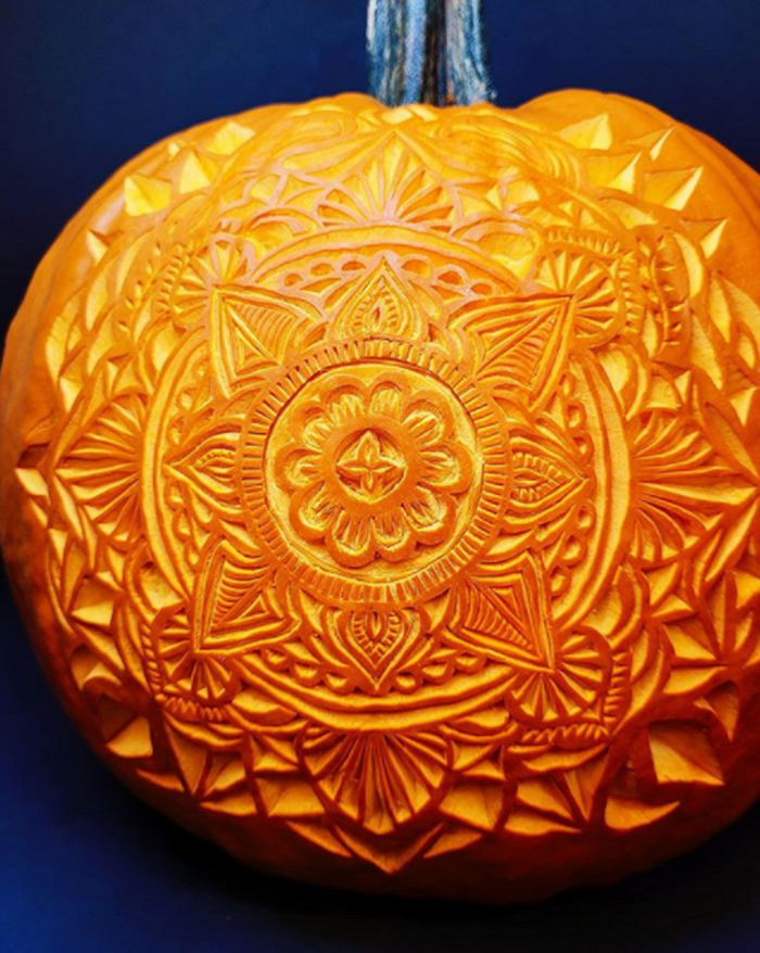 25 Crafty and Creative Pumpkin Carvings for Halloween