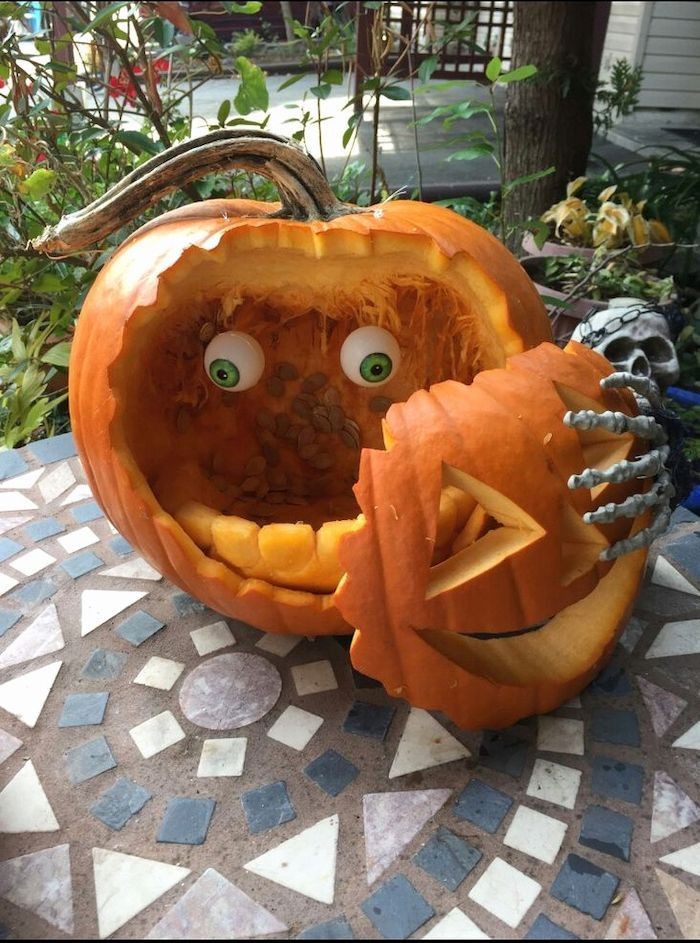 25 Crafty and Creative Pumpkin Carvings for Halloween