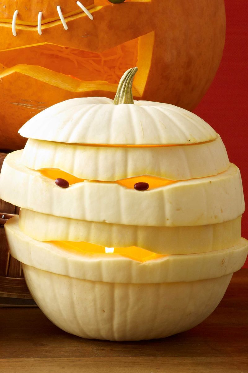 25 Crafty and Creative Pumpkin Carvings for Halloween