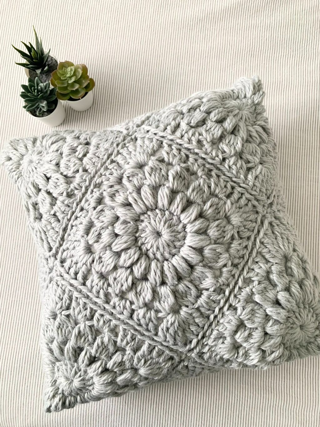 sunburst granny square pillow